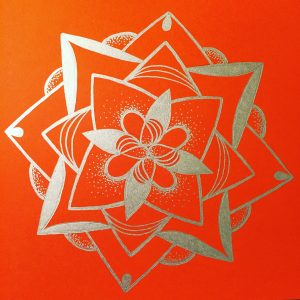 vibrant orange and silver mandala